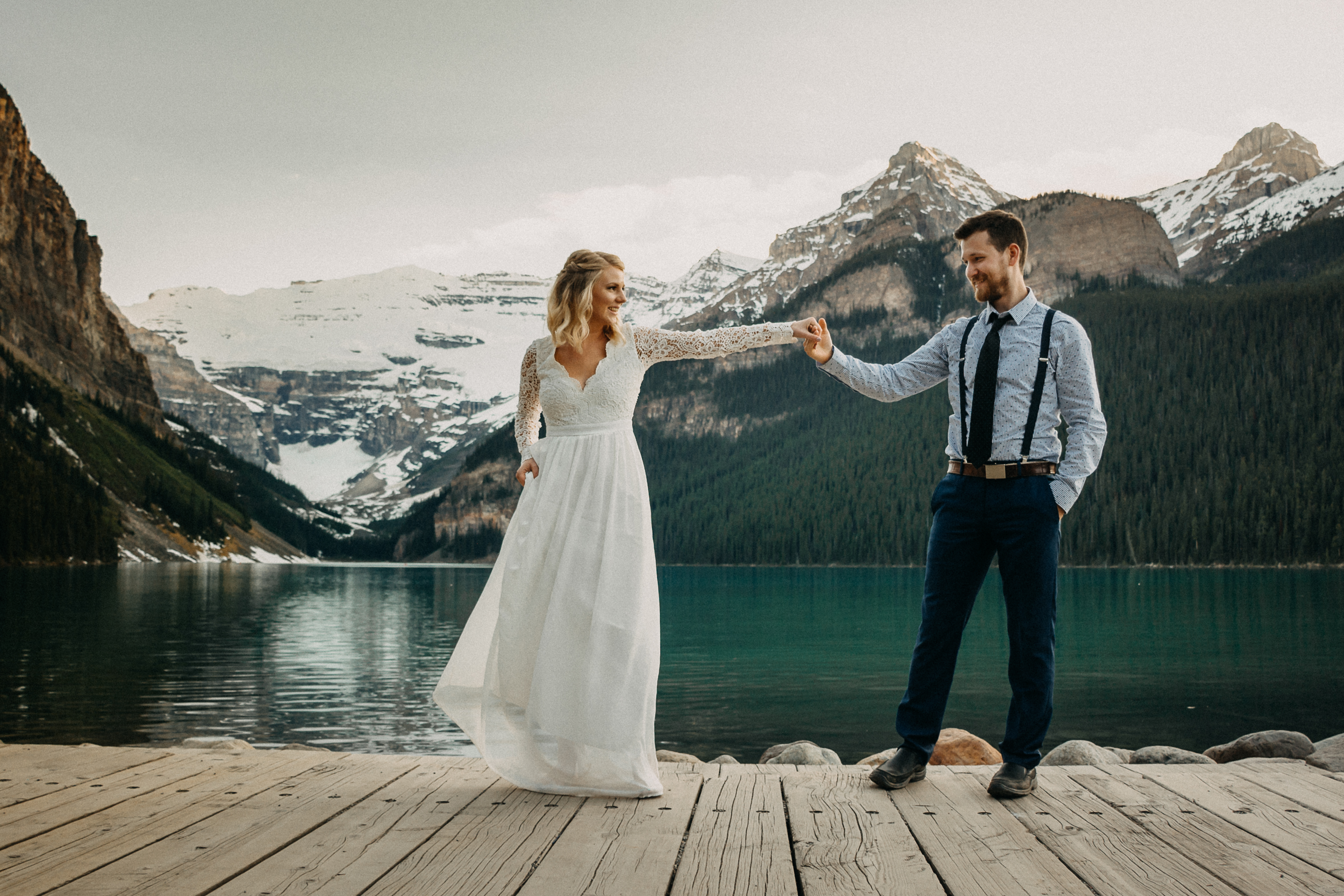 The bride and groom dancing at Lake Louise, Alberta