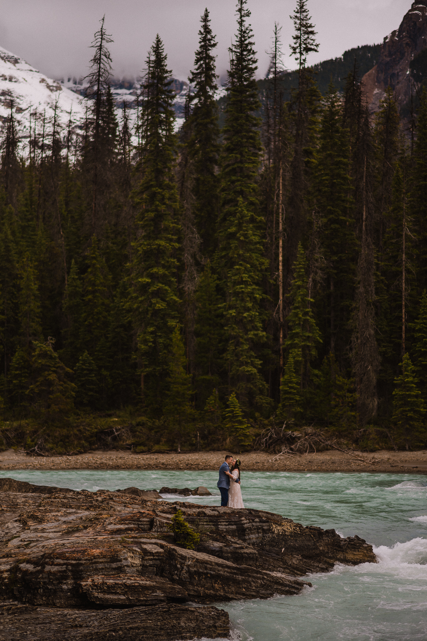Bride and groom holding each other at Yoho National Park